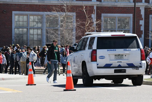 police car next to orange traffic cones
