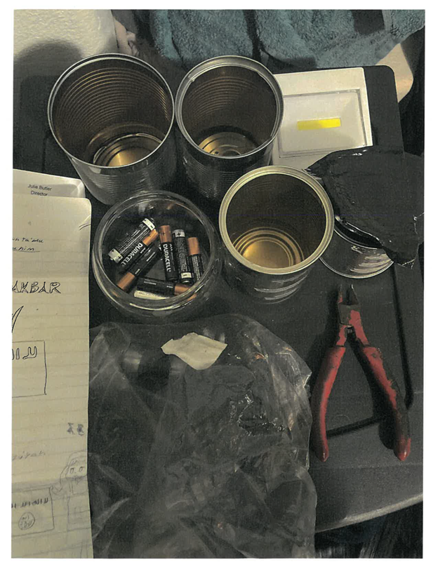 This picture shows empty cans, batteries, and tools; plans to create bomb.